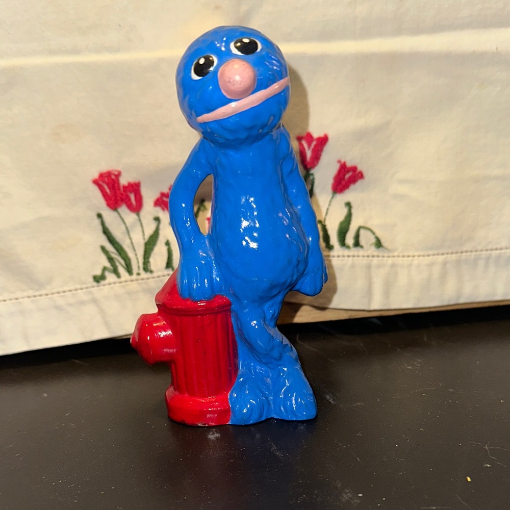 Blue Grover Figurine with Red Fire Hydrant